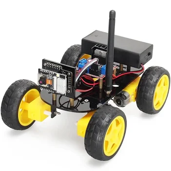 Student holding completed robot